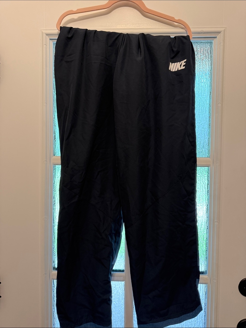 Nike Black Loose-Fit Track Pants with White Logo - Picture 1 of 2